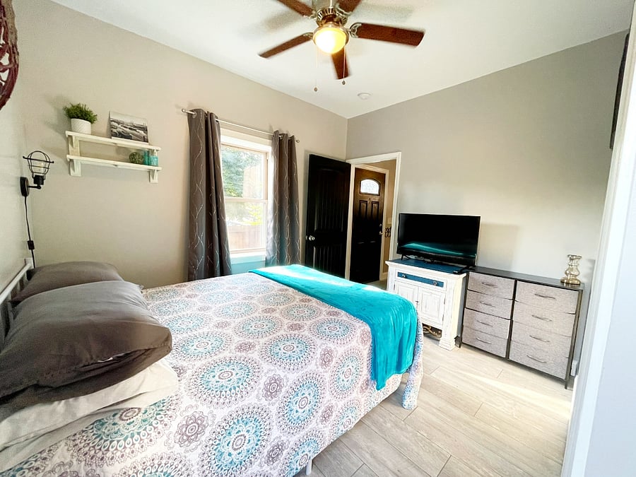 Wide angle photo of bedroom