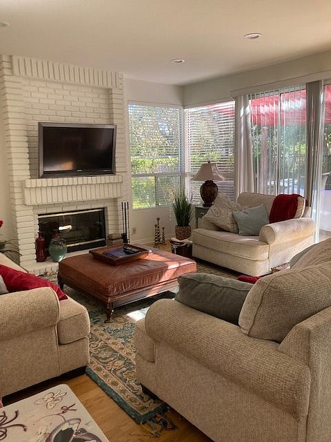 Cozy living room, the TV is enabled with Roku- internet connected