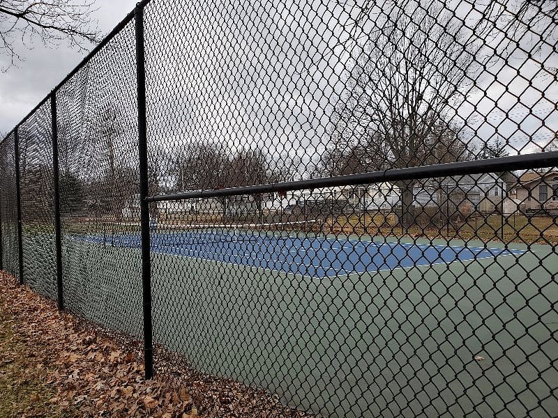 Public tennis court located at nearby park