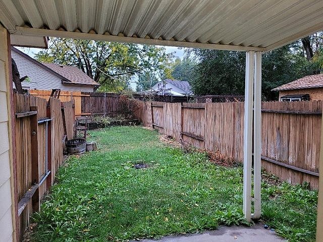 Covered patio and fully fenced back yard