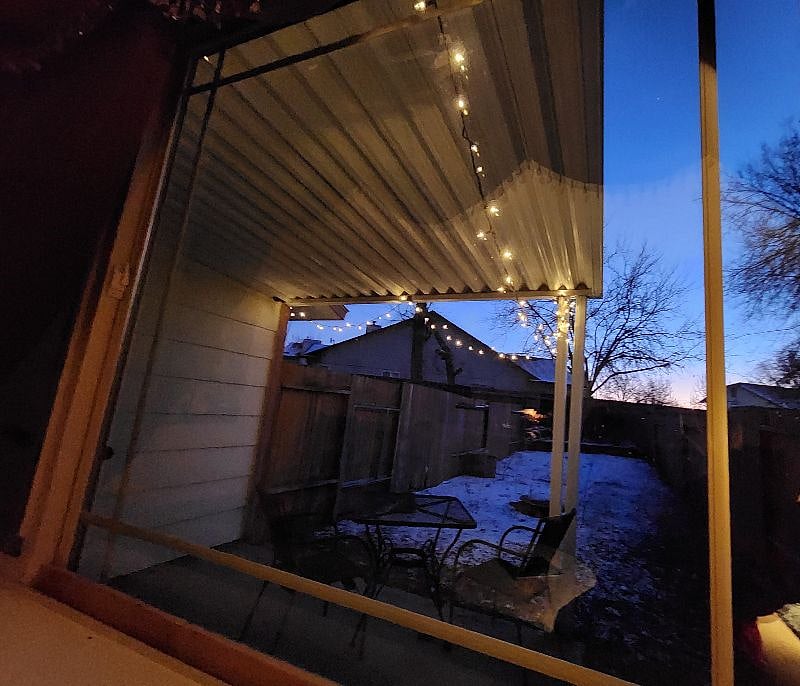 Covered patio and fully fenced back yard