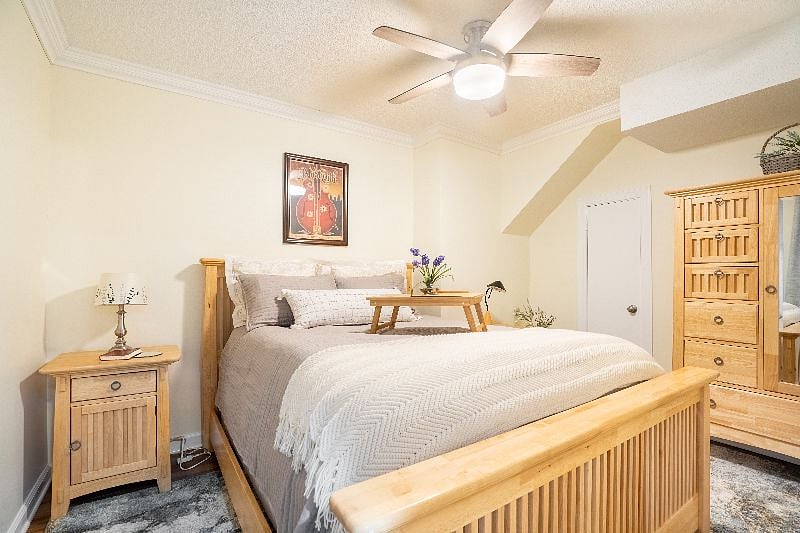 Bedroom with closet and an armoire for more storage!