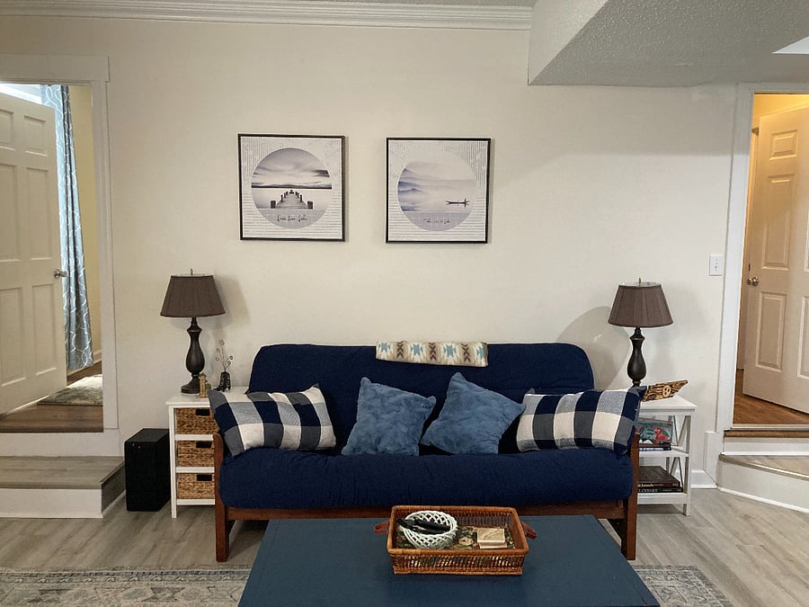Pull out futon mattress and coffee table/end tables for lots of storage!