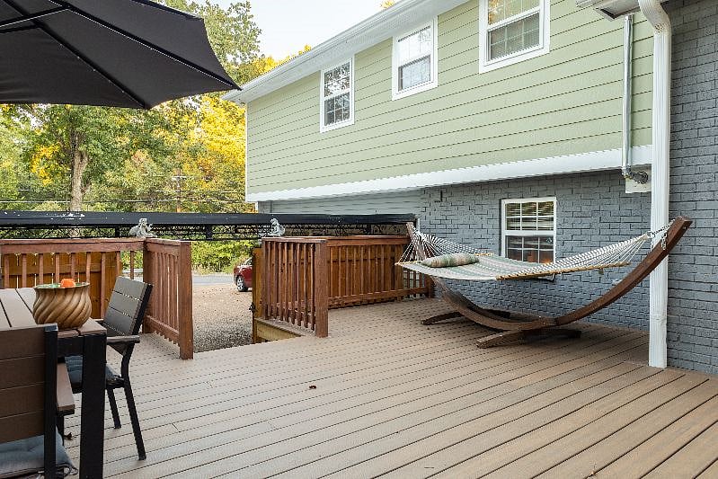 Relax in the privacy of a fenced in back yard and cozy hammock!