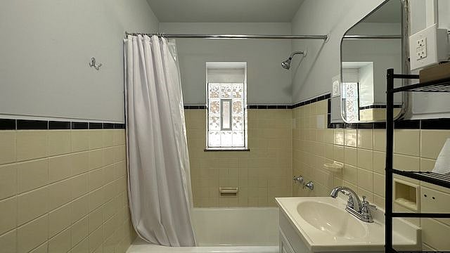 Updated bathroom with natural and LED lighting.