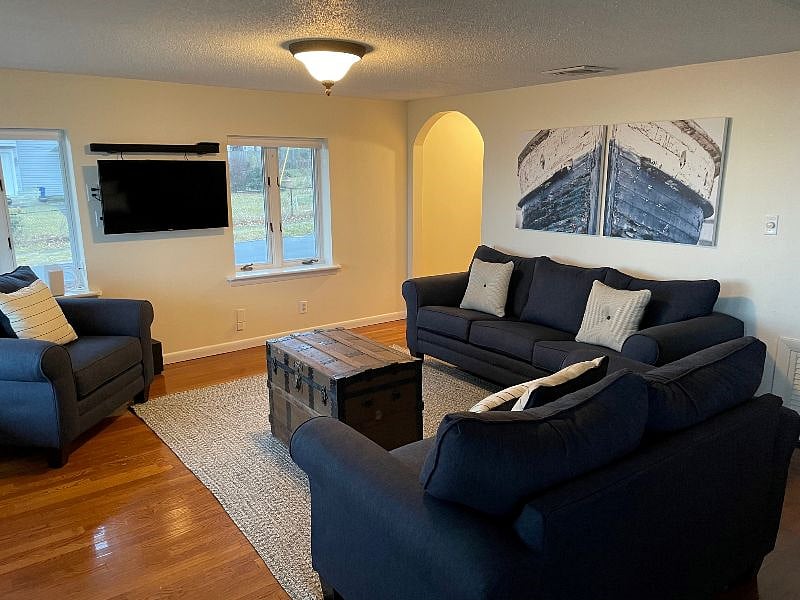 Living room with queen size sofa bed.
