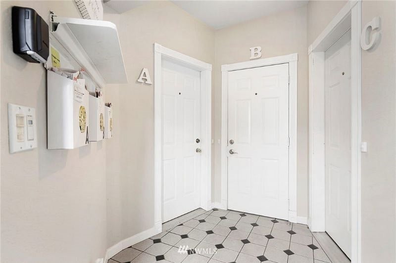Front door's to all 3 units. Units A and C have side entry doors as well.
