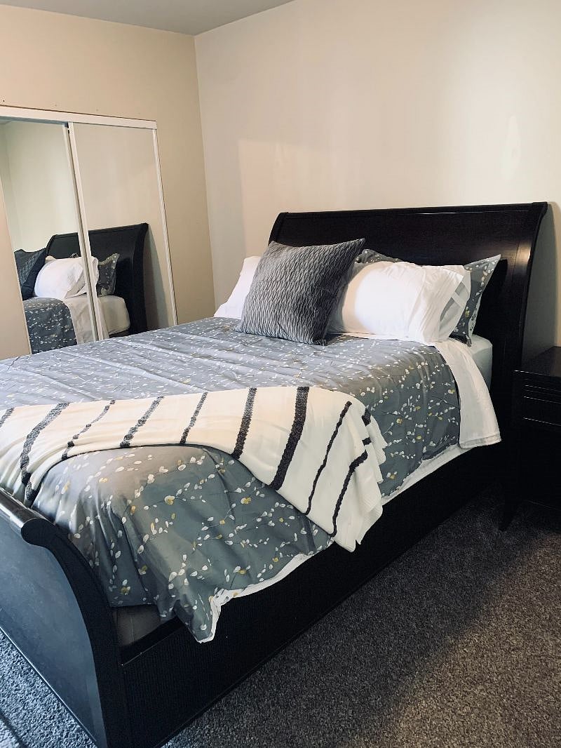 Unit A Bedroom - Queen bed, night stand, and dresser. Full bathroom off of bedroom with Washer and Dryer.