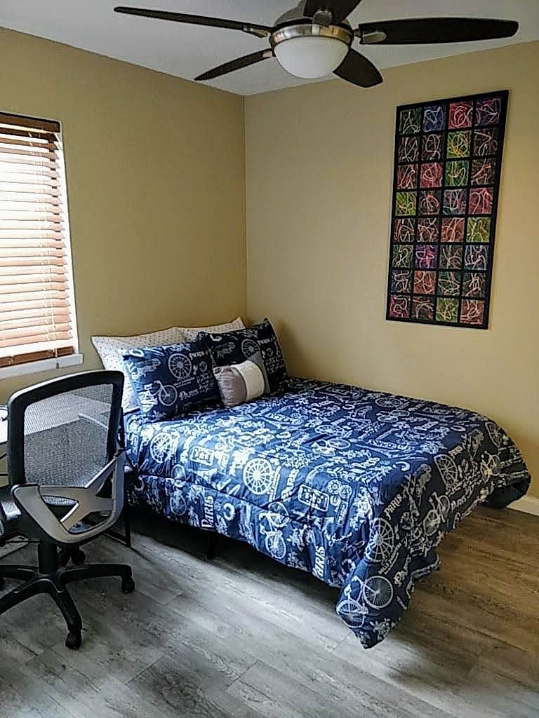 Second bedroom with office desk and chair
