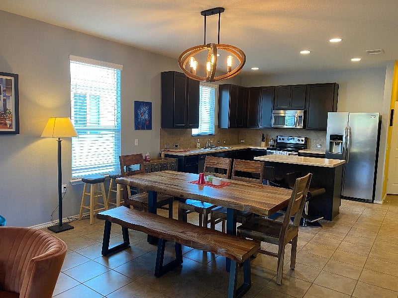 Kitchen with island and plenty of counter space for meal prop. Dining area + island bar seats 8 comfortably. 