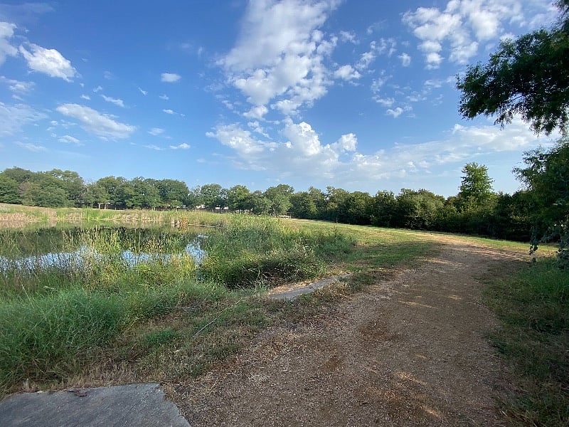 Enjoy the large pond/wooded area; you may fish there, if you'd like.
