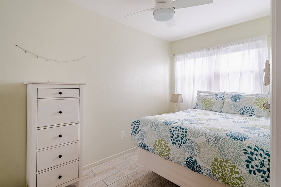 Full bed bedroom with dresser, ceiling fan, blackout shades, very large closet!
