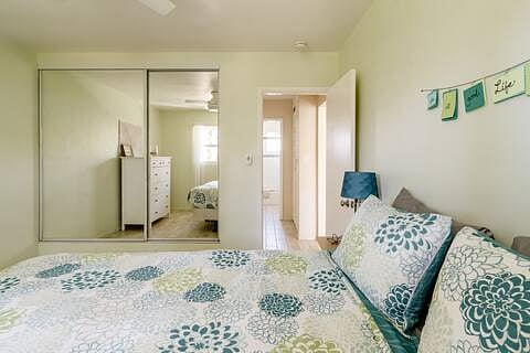 Queen bed bedroom with dresser, ceiling fan, blackout shades, very large closet!