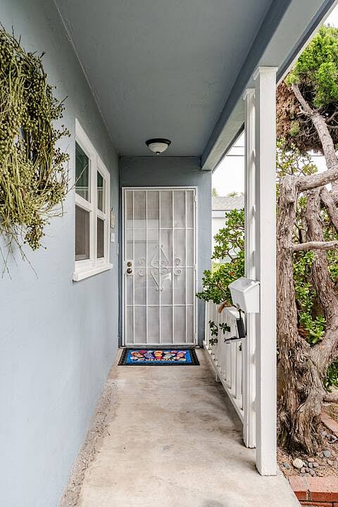 Your front porch entry with metal (locking) screen door to let in the Pacific Ocean coastal breezes!