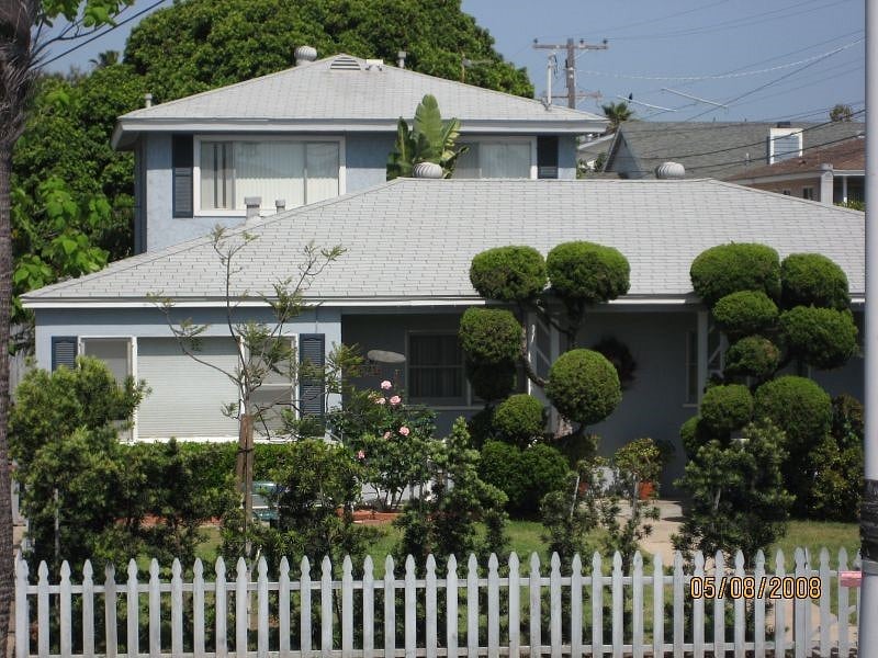 Your new home!  Ground level, surrounded by trees for privacy! 