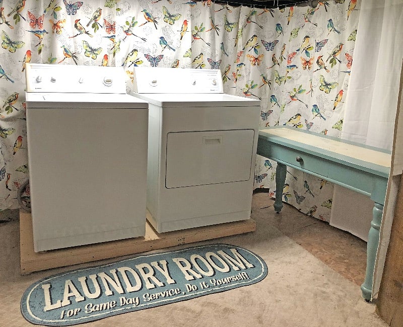 In-unit laundry area in basement