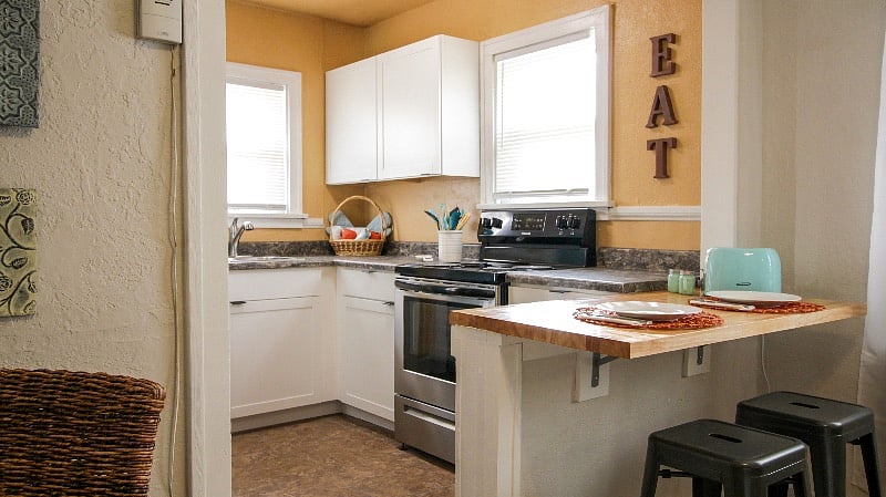 Fully stocked kitchen with stainless steel appliances