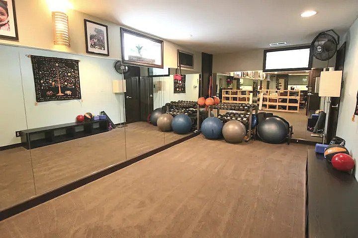 Use the fitness area for a cardio workout, strength training, yoga, or meditation. The exercise area is complete with free weights, exercise balls, resistance bands, yoga mats, a foam roller, and medicine balls.