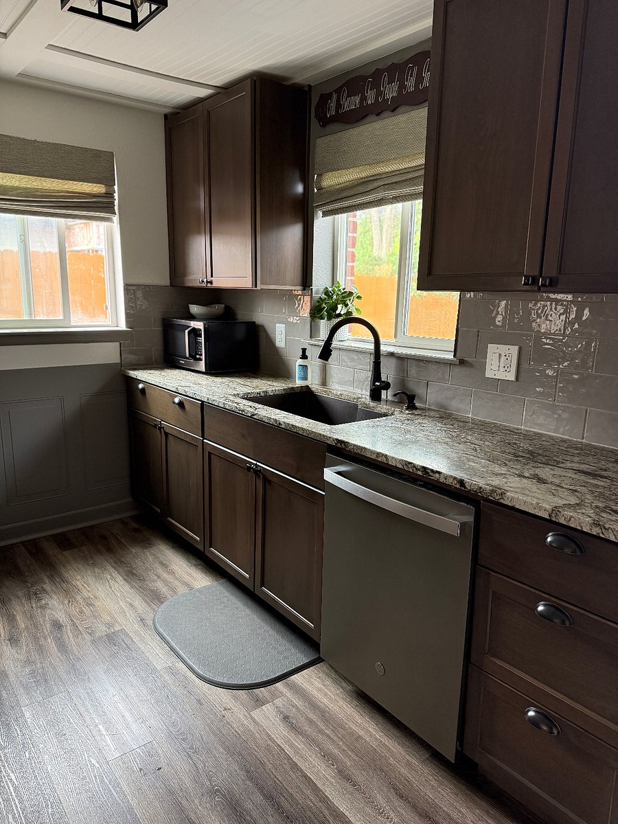 Kitchen sink and dishwasher.