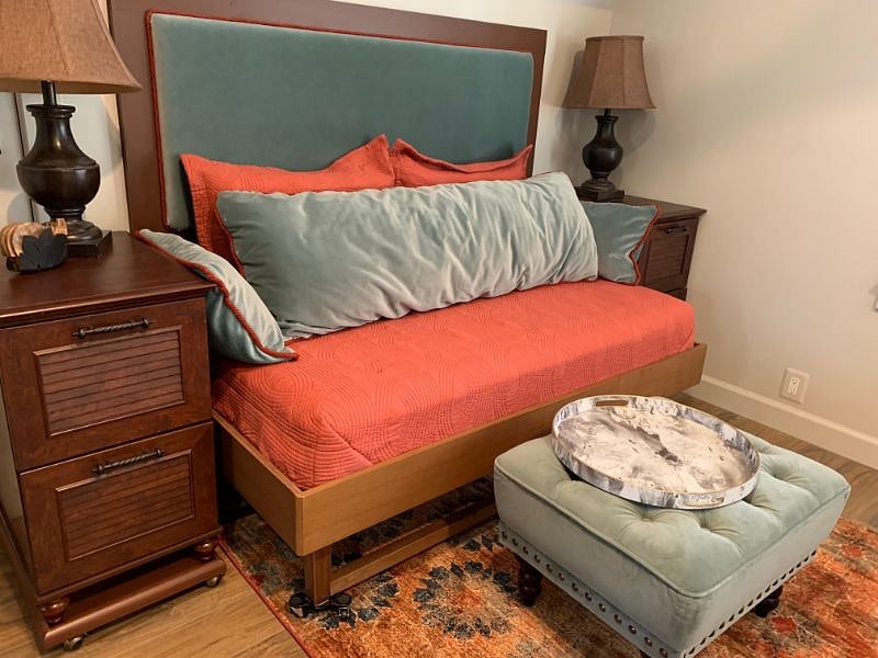 Bed pushed into eave to create Couch