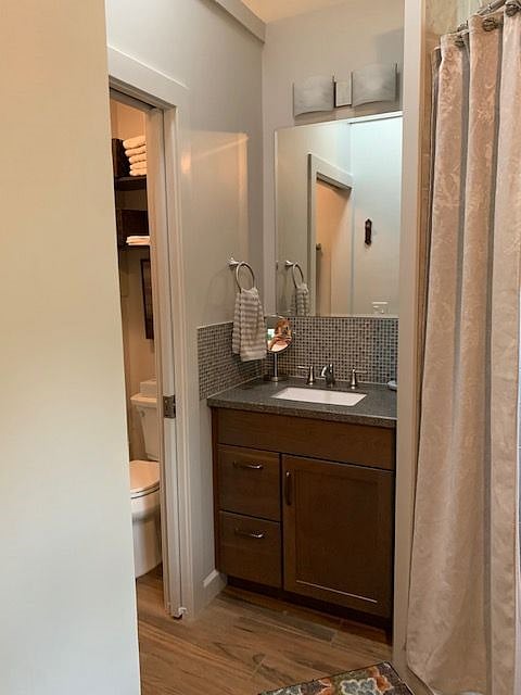 Skylight over vanity; medicine cabinet to the right