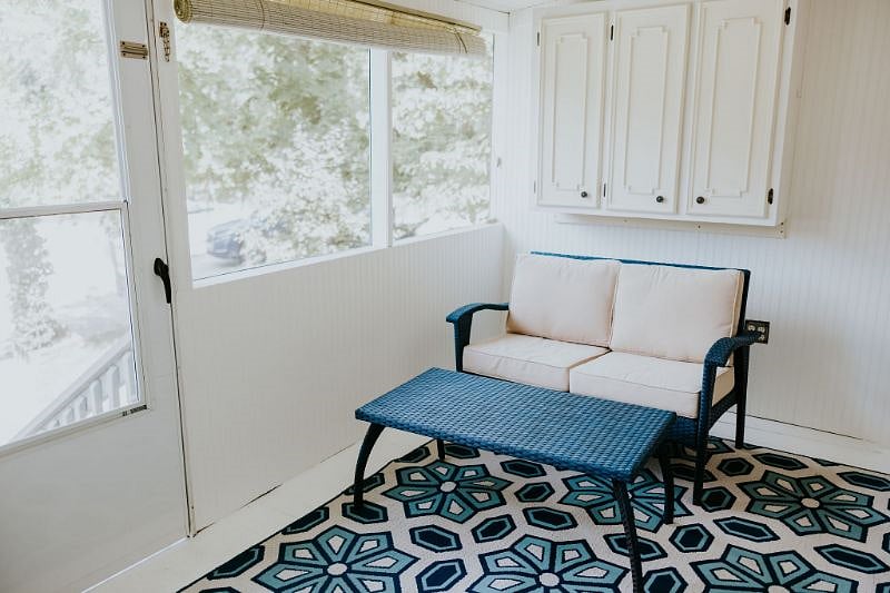 Screened back patio.
Back door is secured with a keyless entry and security cameras 