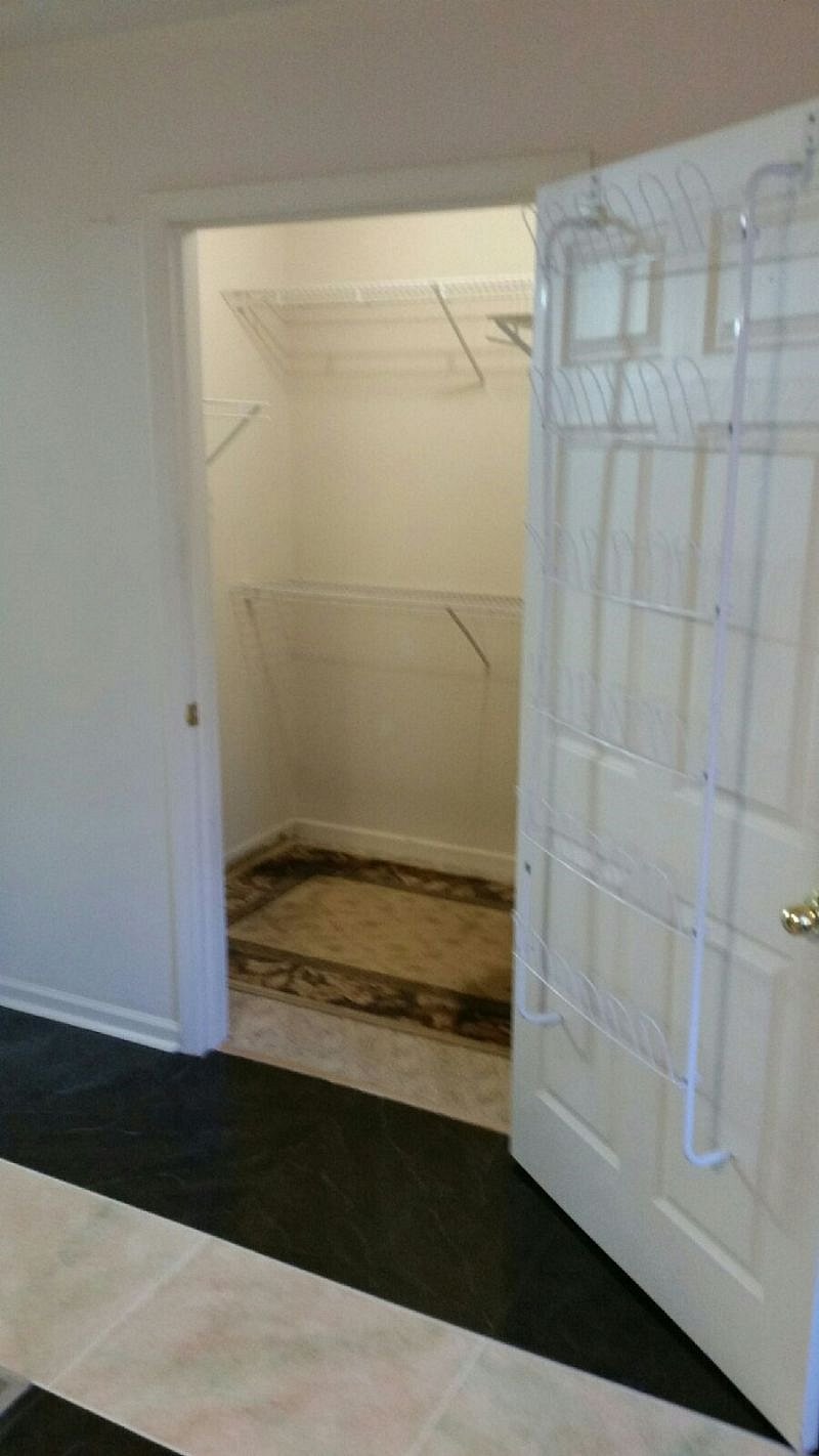 Walk in closet in bedroom