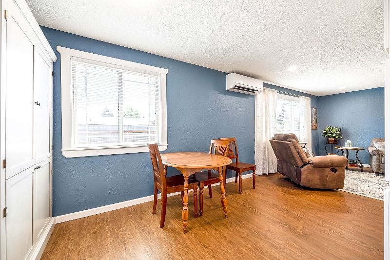 Dining table has two leaves that can be added to accommodate guests or game night.