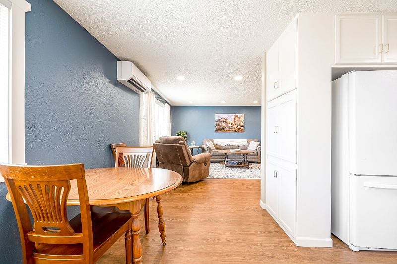 Additional chairs can be found at the desk and in the second bedroom.