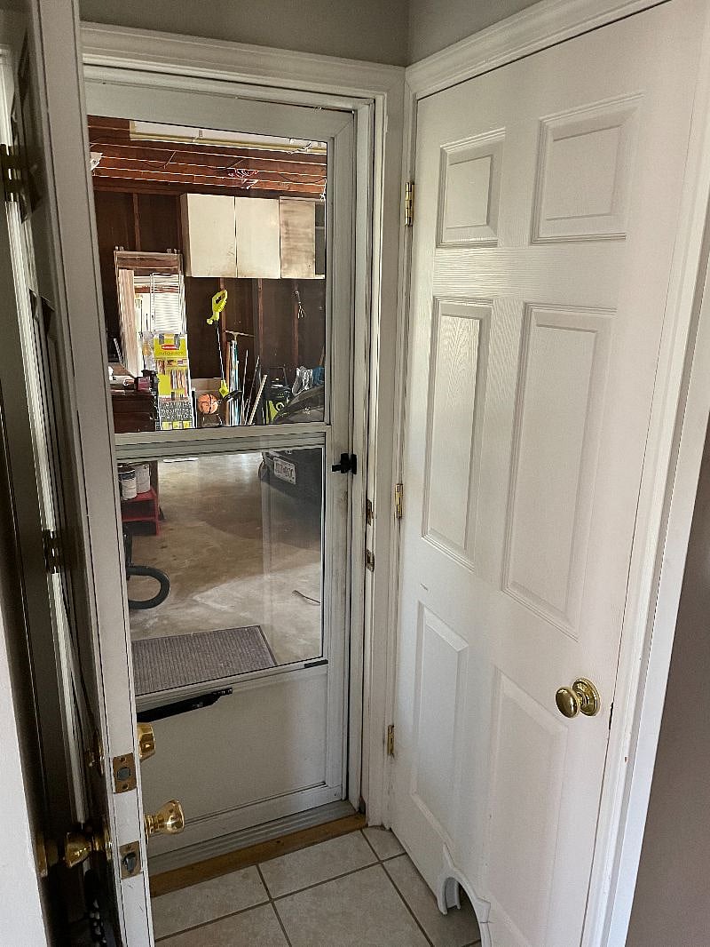 View to garage, from kitchen, basement door closed