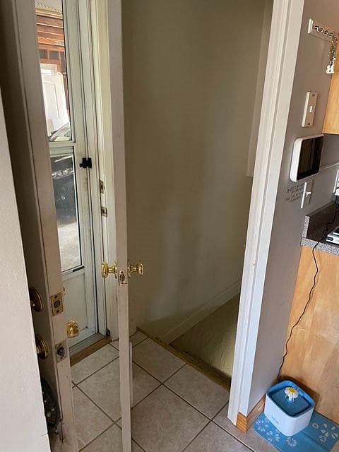 View from main kitchen, to garage entrance and basement entrance