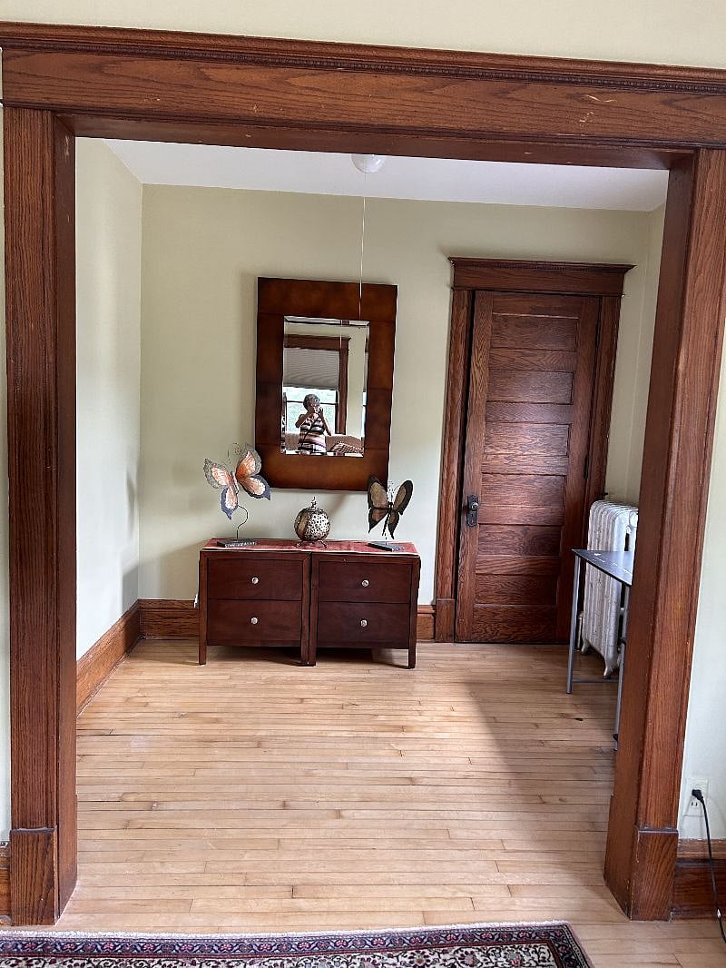Beautiful entry way with coat closet.