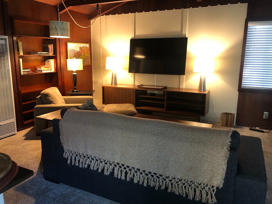 Hideabed couch
Work desk to the right
