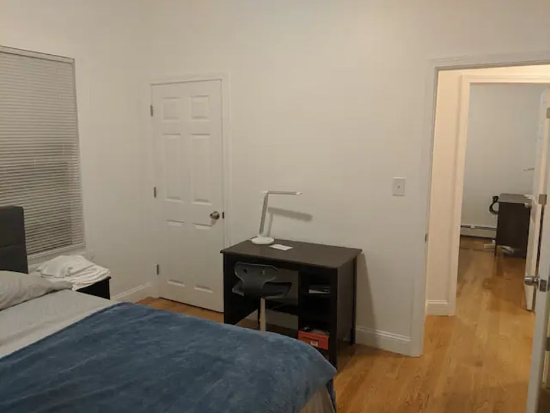Huge closet, desk/chair/LED lamp, and nightstand in each bedroom