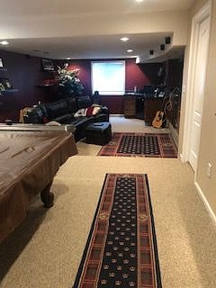 Pool table, tv area, kitchenette