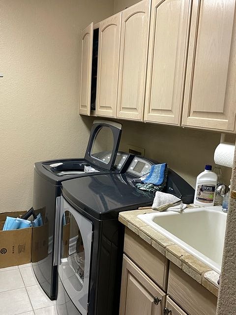 Laundry room with sink and folding table