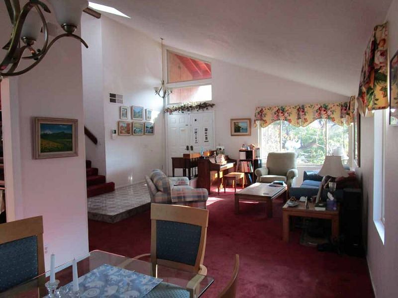 Open floor plan includes a piano
