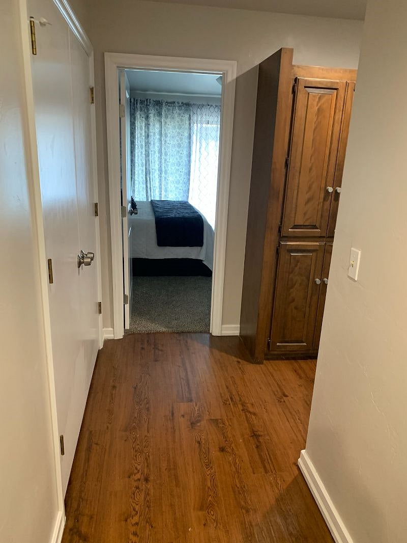 Hallway with access to washer and dryer