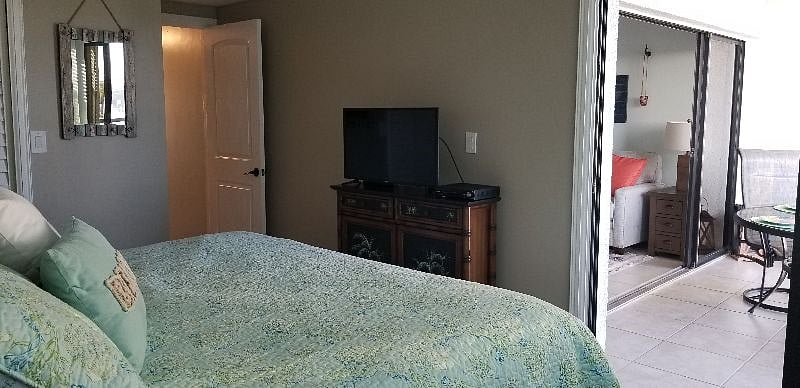 A smart tv in the master bedroom.