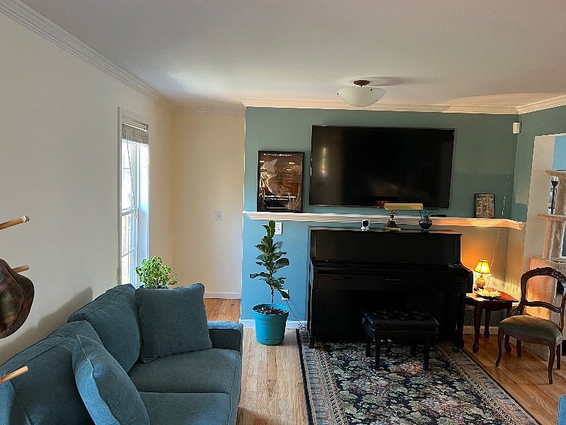 left corner is the hidden stairwell to the room rental.