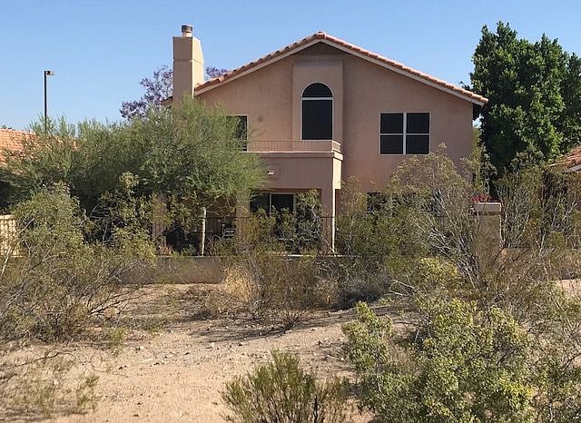 Back of the home from the golf course.