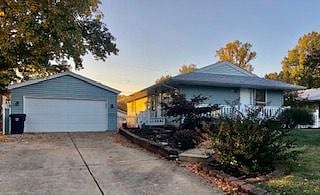 Side of House, Another Entrance, Driveway (Garage
is Not Included in Rental)