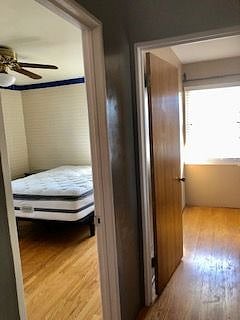 Hallway into Master Bedroom and Smaller Bedroom (End of Hall)