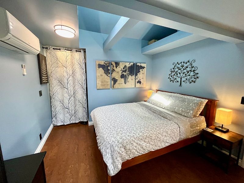 Deluxe queen bed and light-blocking blinds for deep cozy sleep.