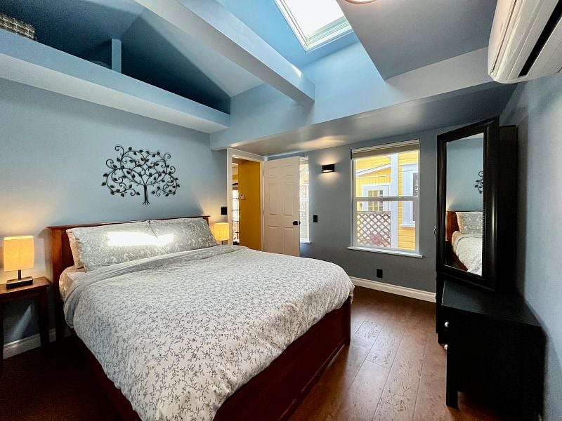 Skylight and windows add brightness, and lots of storage for clothes and luggage.