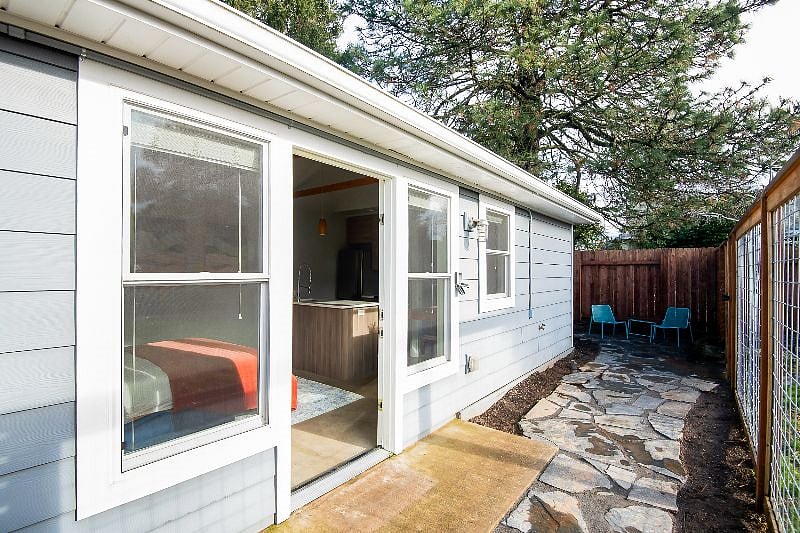 your own private fenced patio with outdoor seating