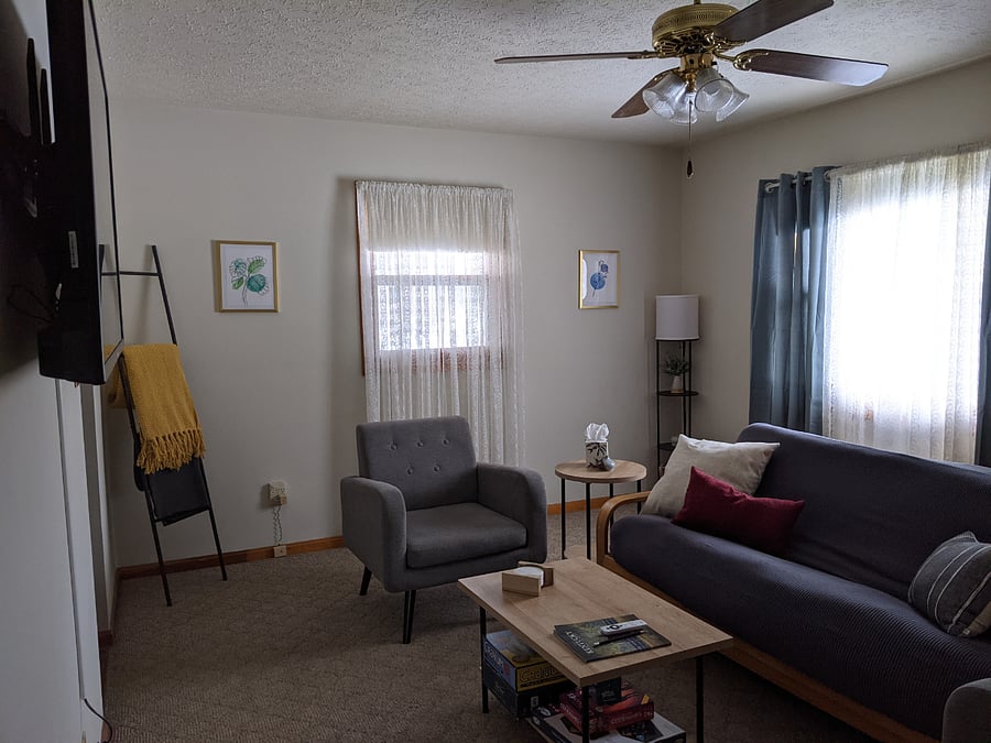 Living room with smart TV and board games
