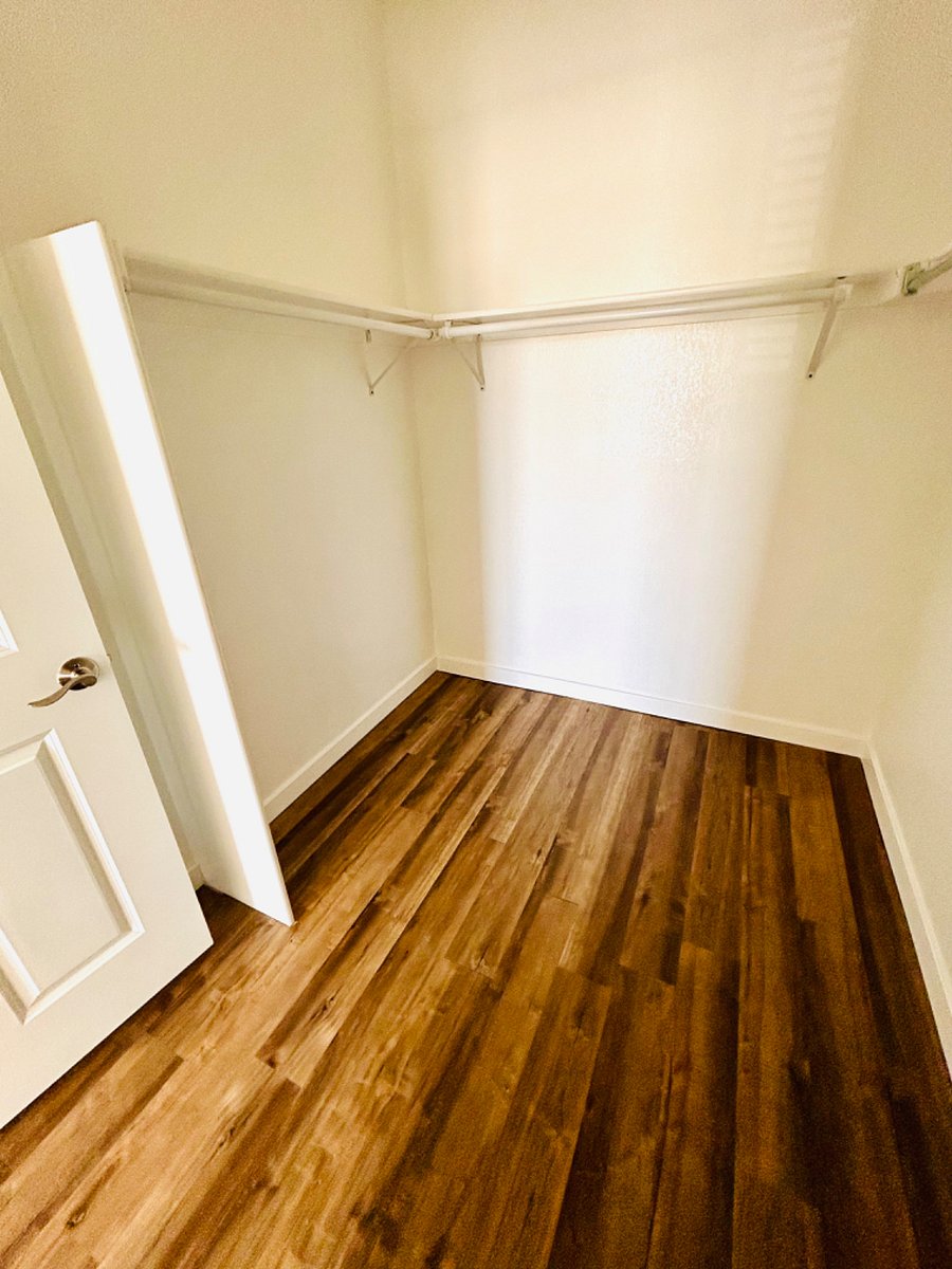 Walking closet from master bedroom with plenty of storage