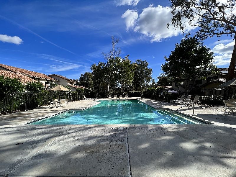 Hottub and pool are both close to the home.