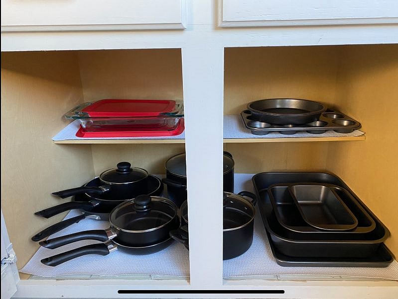 Trendy kitchen features white subway tile, Quartz countertops, Stainless Steel appliances and is fully-stocked for your stay.